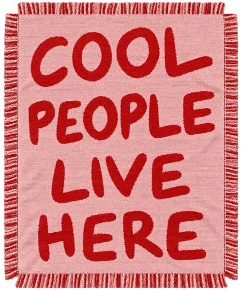 The Cool People Live Here throw. Brushy red letters on dusty pink. For the sofa, or the front door.